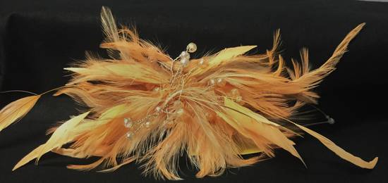 Apricot coloured feather fascinator - one only