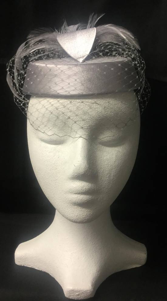 Silver pillbox hat with veiling - one only