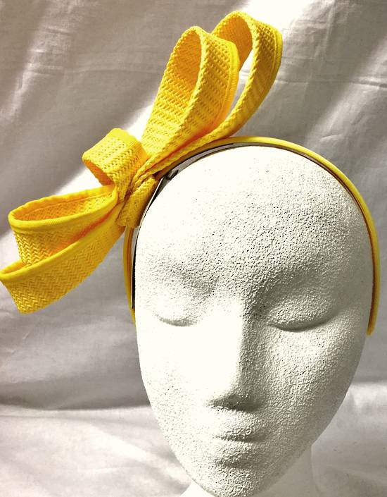 Yellow looped fascinator on headband
