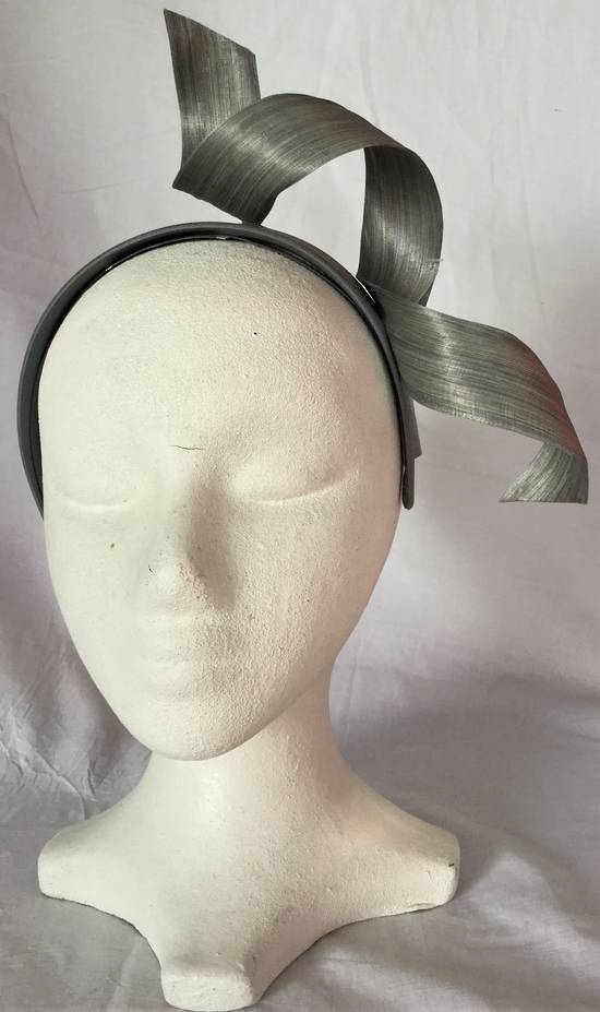 Silver twist fascinator on a headband - one only